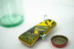 Recycled skateboard bottle opener
